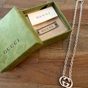Gucci Sterling Silver Necklace with Iconic Logo Pendant